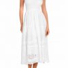 Falda larga y vestido multiposición troquelado de algodón blanco - Vista frontal completa - Ana Faura