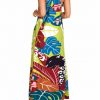 Vestido largo tropical anudado al cuello con estampado de manchas y hojas en verde lima - Vista de la espalda - Ana Faura
