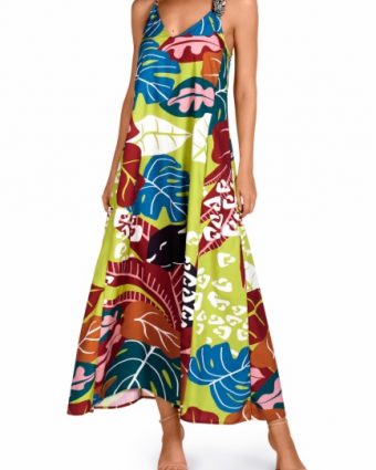 Vestido largo tropical anudado al cuello con estampado de manchas y hojas en verde lima - Vista frontal completa - Ana Faura